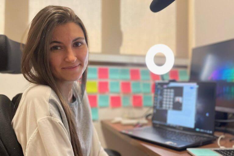 Alexandra Schelling at her desk creating content for Toolbox for Love