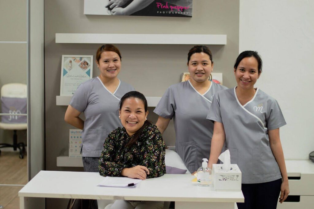 Janice Bustamante-Aton with her colleagues at Malaak Mama and Baby Care