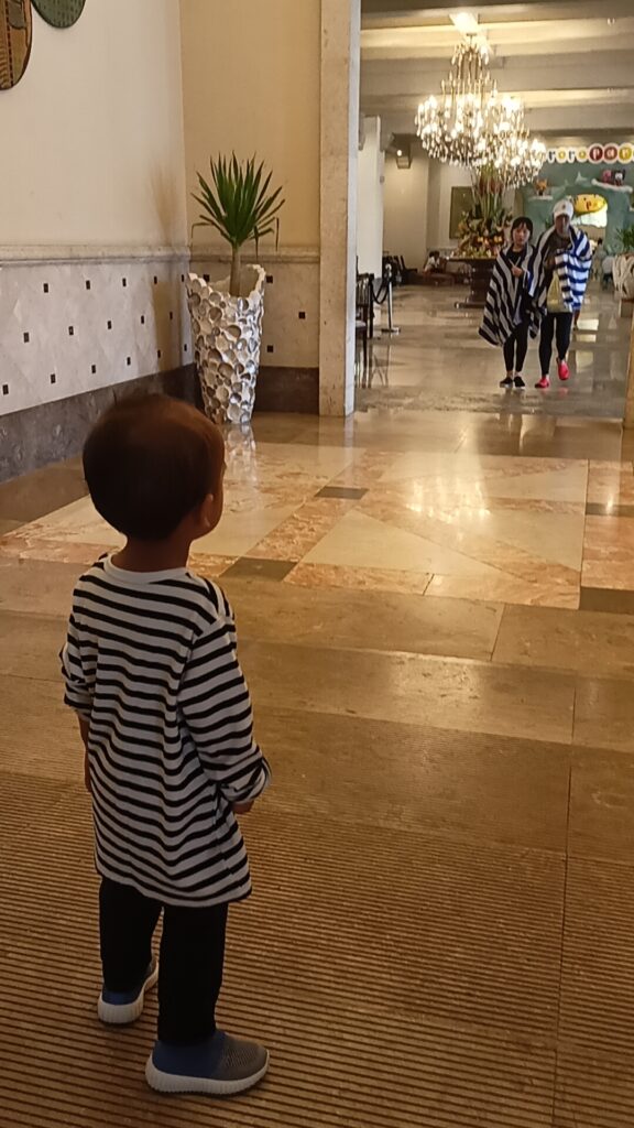 An image of a toddler at the main lobby of Jpark