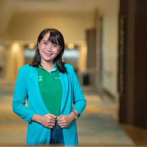 an image of a woman smiling with confidence