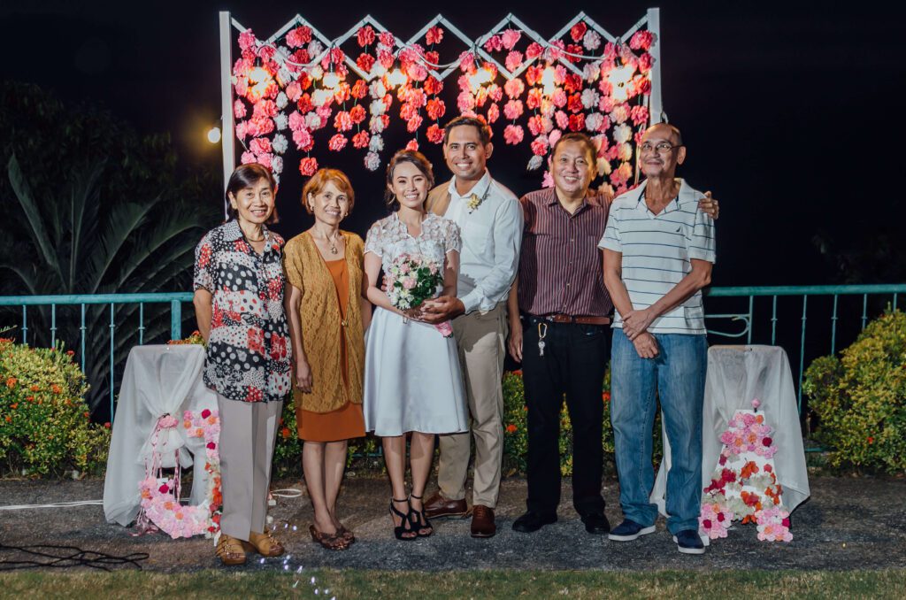 Adrienne and Jan Ray Rulida with the Reyes family — Adrienne's parents, aunt and uncle — at their civil wedding